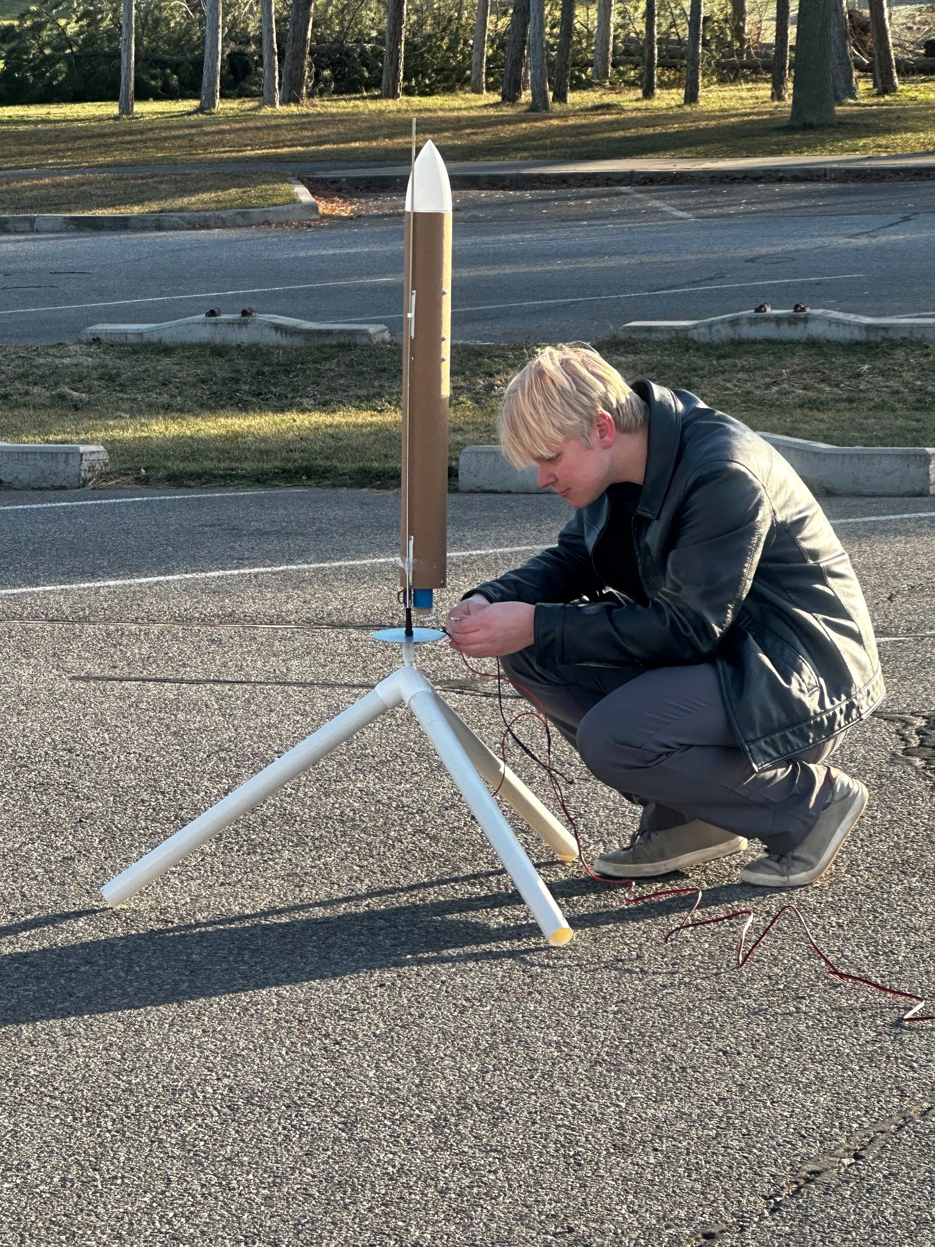TVC rocket on custom test stand outdoors